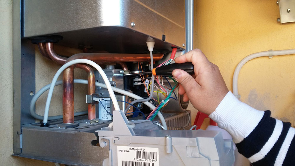 A handyman repairing an appliance